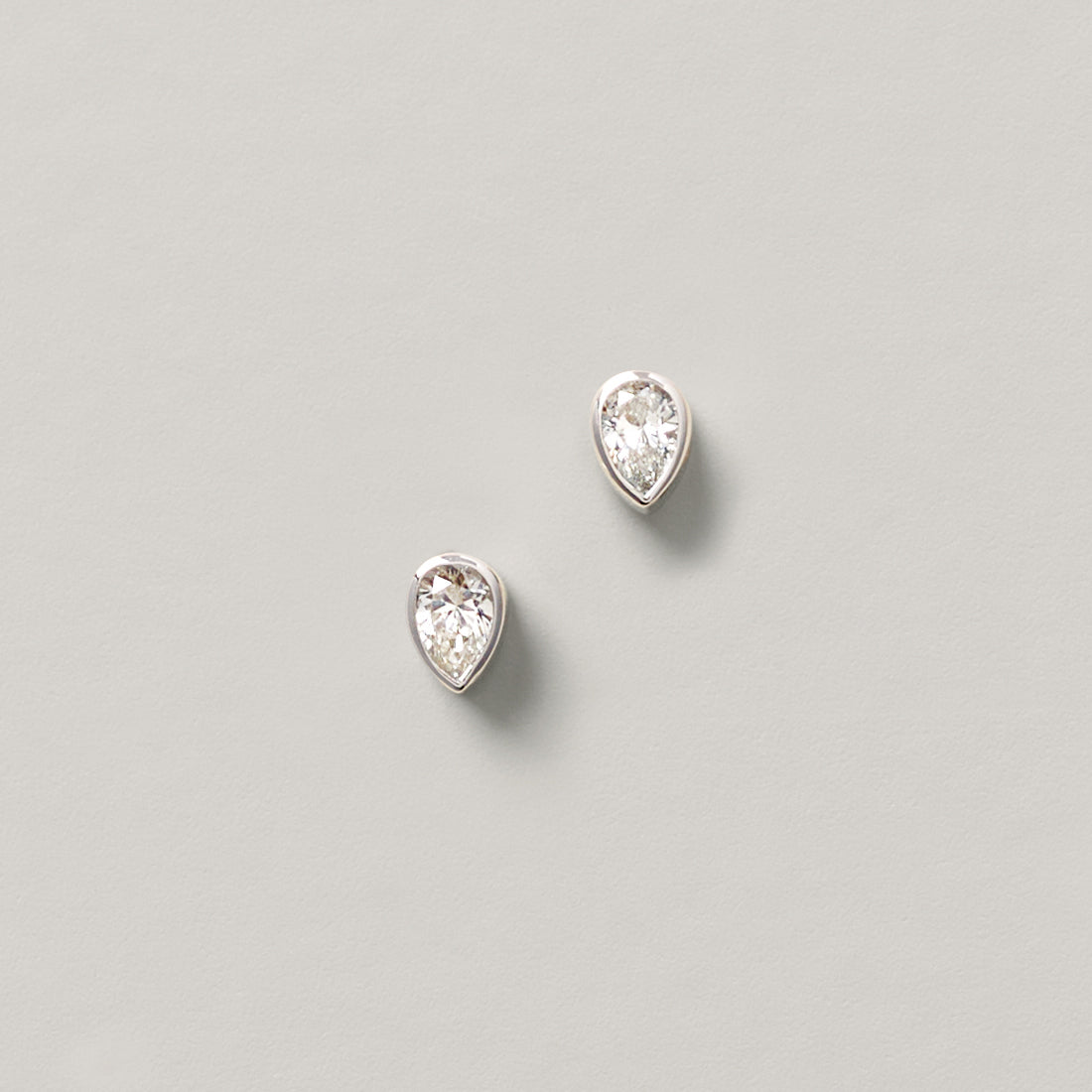 Petite Bezel Post Earrings | Pear Diamond